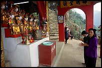 Praying at an outdoor temple. Perfume Pagoda, Vietnam (color)