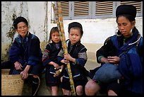 Hmong women kids with sugar cane. Sapa, Vietnam (color)