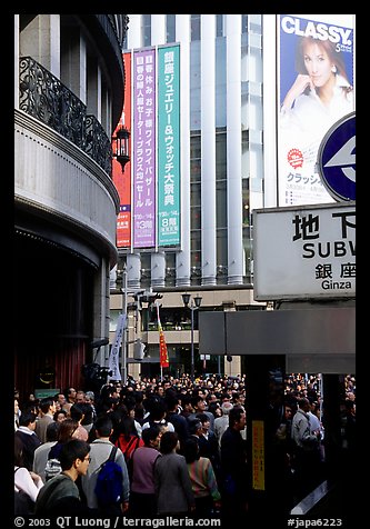 Crowds on the street near the Ginza subway station. Tokyo, Japan