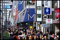 Crowded avenue in the Ginza shopping district. Tokyo, Japan (color)