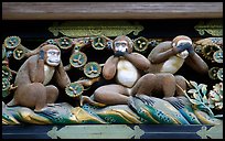 Three-monkey relief carving (hear no evil, see no evil, speak no evil) on Shinkyusha. Nikko, Japan ( color)