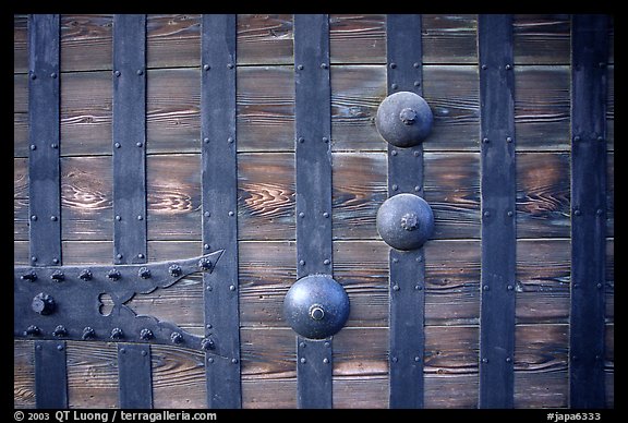 Detail of heavy wooden door. Himeji, Japan