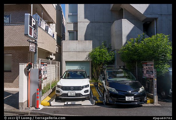Parking lot for two cars. Tokyo, Japan (color)
