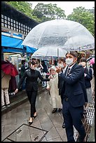 Visitors with umbrellas. Enoshima Island, Japan ( color)