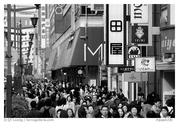 Crowded avenue in the Ginza shopping district. Tokyo, Japan
