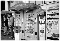 Automatic vending machines dispensing everything, including pornography. Tokyo, Japan (black and white)