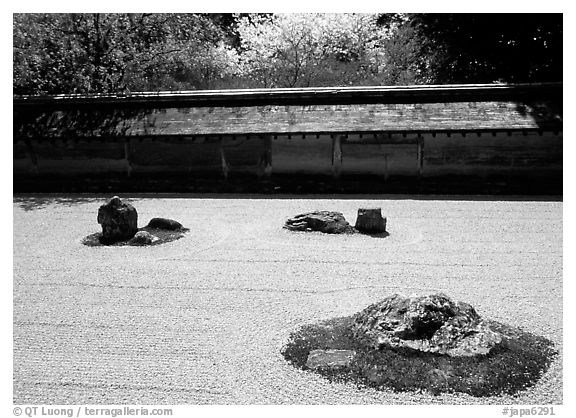 Classic stone and raked sand Zen garden, Ryoan-ji Temple. Kyoto, Japan (black and white)