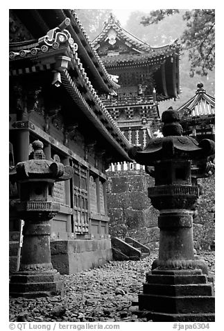 Urns, pavilion, and main hall in Tosho-gu Shrine. Nikko, Japan (black and white)