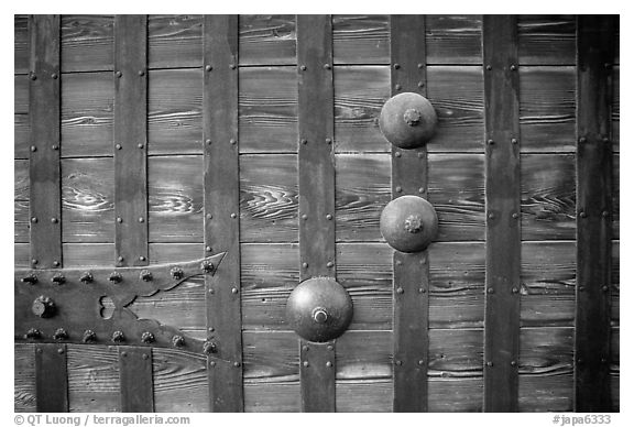 Detail of heavy wooden door. Himeji, Japan (black and white)