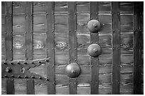 Detail of heavy wooden door. Himeji, Japan (black and white)