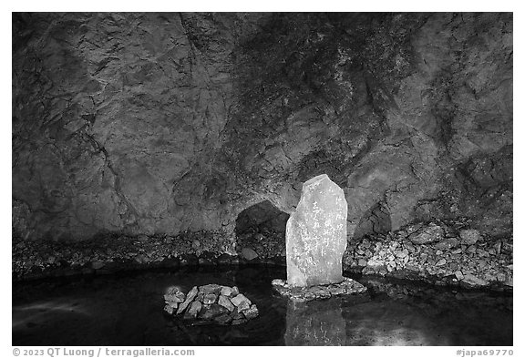 Inscribed rock in pool, Enoshima Iwaya Caves. Enoshima Island, Japan (black and white)