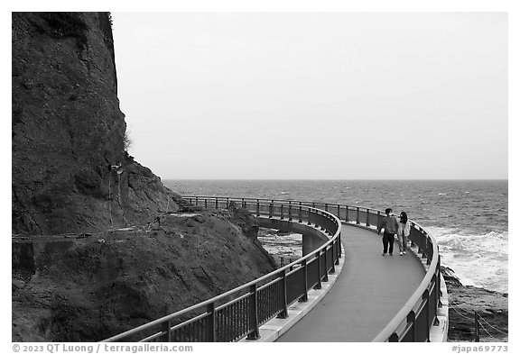 Walkway to Enoshima Iwaya Caves. Enoshima Island, Japan (black and white)