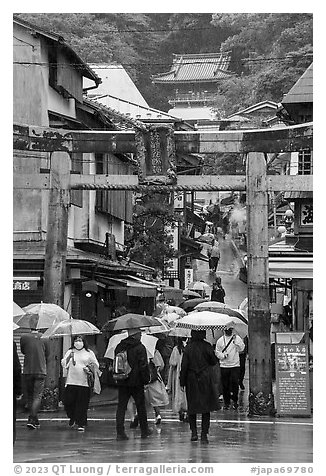 Alley with a statue. Enoshima Island, Japan (black and white)