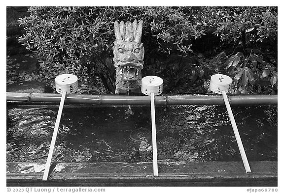 Containers for ritual cleansing. Enoshima Island, Japan (black and white)