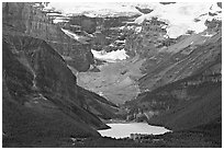 Distant view of Lake Louise and Chateau Lake Louise at the base of Victorial Peak. Banff National Park, Canadian Rockies, Alberta, Canada ( black and white)
