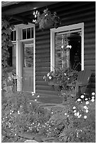 Flowered porch of a wooden cabin. Banff National Park, Canadian Rockies, Alberta, Canada (black and white)