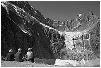 Hikers looking at Angel Glacier and Cavell Glacier. Jasper National Park, Canadian Rockies, Alberta, Canada (black and white)