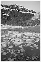 Cavell Pond, with the face of Mt Edith Cavell looming above, sunrise. Jasper National Park, Canadian Rockies, Alberta, Canada ( black and white)