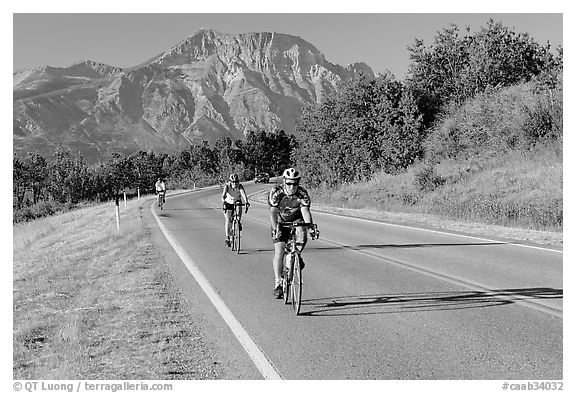 Cyclists on road. Waterton Lakes National Park, Alberta, Canada (black and white)