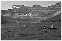 Canoists on Cameron Lake. Waterton Lakes National Park, Alberta, Canada ( black and white)