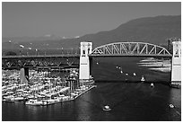 Burrard Bridge and mountains. Vancouver, British Columbia, Canada ( black and white)