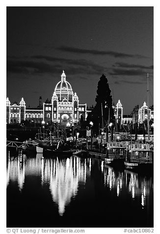 Parliament buildings lights reflected in the harbor. Victoria, British Columbia, Canada