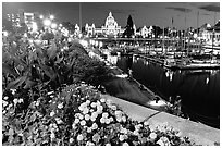 Flowers, inner harbour, and lights at night. Victoria, British Columbia, Canada ( black and white)
