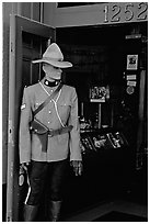 Mannequin representing a Canadian police at the entrance of a store. Victoria, British Columbia, Canada ( black and white)
