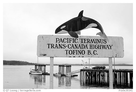 Sign marking the Pacific terminus of the trans-Canada highway, Tofino. Vancouver Island, British Columbia, Canada (black and white)