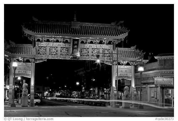 Gate of Harmonious Interest marking the entrance of Chinatown, night. Victoria, British Columbia, Canada