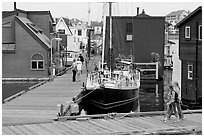 Houseboats, deck, and sailboat, Upper Harbour. Victoria, British Columbia, Canada ( black and white)
