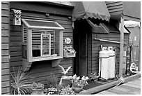 Houseboat window and propane tanks. Victoria, British Columbia, Canada ( black and white)
