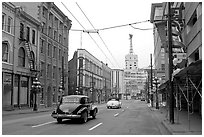 Street in Gastown with two old cars. Vancouver, British Columbia, Canada ( black and white)