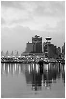 Canada Palace at night and Harbor Center at dawn. Vancouver, British Columbia, Canada (black and white)