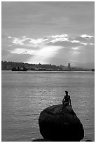 Girl in wetsuit statue, sunrise, Stanley Park. Vancouver, British Columbia, Canada ( black and white)