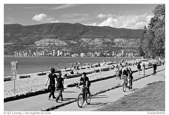 Bicyclists, and walkers,  Stanley Park. Vancouver, British Columbia, Canada (black and white)
