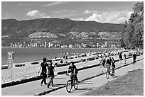 Bicyclists, and walkers,  Stanley Park. Vancouver, British Columbia, Canada (black and white)