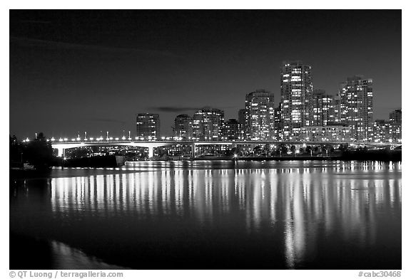 Skyline seen across False Creek at night. Vancouver, British Columbia, Canada (black and white)