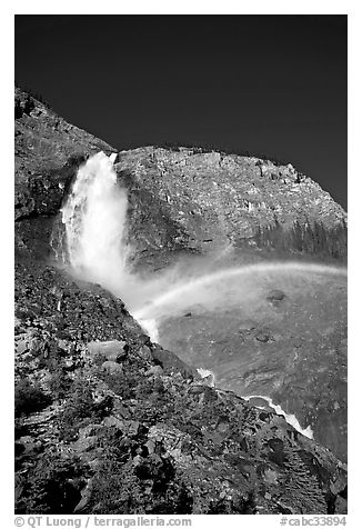 Rainbow formed in the mist of Takakkaw Falls. Yoho National Park, Canadian Rockies, British Columbia, Canada (black and white)