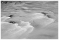 Water flowing in Tokkum Creek. Kootenay National Park, Canadian Rockies, British Columbia, Canada ( black and white)