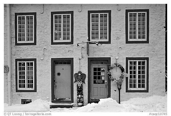 Facade in winter with snow on the curb,  Quebec City. Quebec, Canada (black and white)