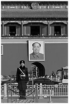 Guard in winter uniform and Mao Zedong picture, Tiananmen Square. Beijing, China (black and white)