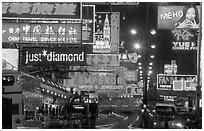 Nathan road, bustling with animation  at night, Kowloon. Hong-Kong, China (black and white)