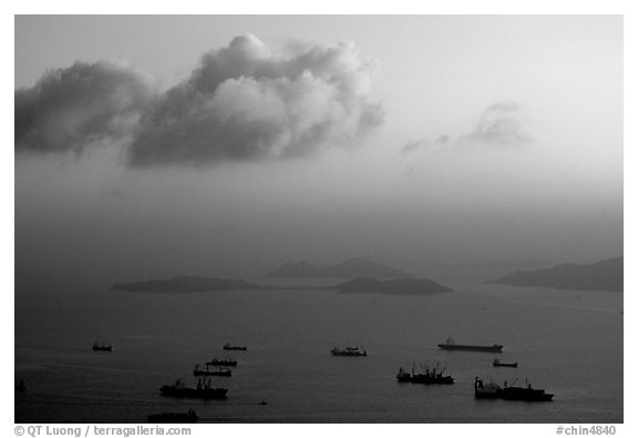 Cargo ships anchored outside of the harbor. Hong-Kong, China
