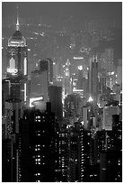 Center building with changing lights from Victoria Peak at night. Hong-Kong, China ( black and white)