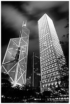 Bank of China (369m) and Cheung Kong Center (290m) buildings at night. Hong-Kong, China (black and white)