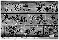 Naxi pictographs, the only hieroglyphic language still in use. Baisha, Yunnan, China ( black and white)