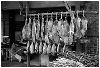 Ham made with cattle legs, salted when raw, and dried under the sun. Kunming, Yunnan, China ( black and white)