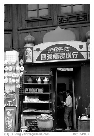 Store owned by a woman of the Muslim community. Kunming, Yunnan, China (black and white)