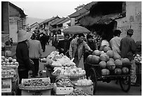 Fruits for sale on an old street. Dali, Yunnan, China ( black and white)